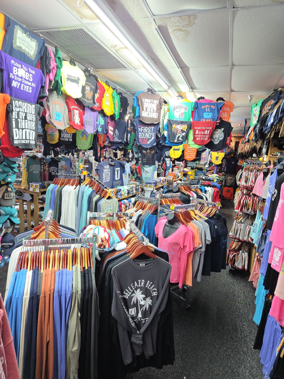 Additional clothing and store inventory display inside Merry Mouse